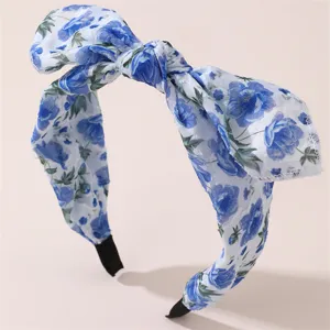 Blue floral chiffon bow headband, elegant hair accessory for women and girls daily styling detail.
