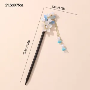 Traditional Chinese style floral hairpin with elegant tassel and pearl details.