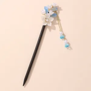 Exquisite ancient style floral hair stick with tassels, perfect for traditional Hanfu.