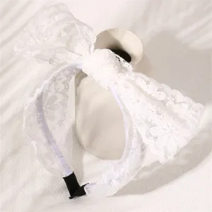 White lace bow headband detail shot, sweet and stylish wide hair hoop for women and girls daily wear.
