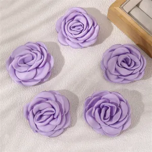 Purple rose fabric hair clip set detail, elegant flower side hairpin for women photography.
