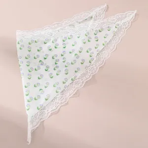 Floral lace triangle hair scarf detail, lightweight fabric with purple flower print and white lace.