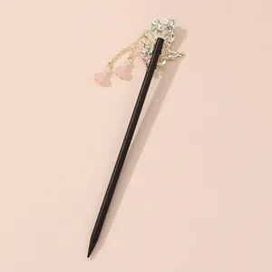 Elegant vintage Chinese hair stick with floral metal design and pink beaded tassel chains.