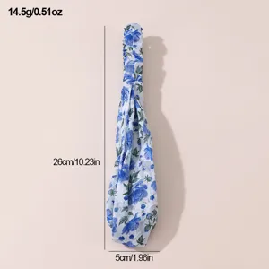 Chiffon blue floral hair band detail, measuring 26cm in length and 5cm in width, lightweight.