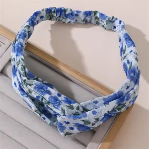 Blue floral fabric headband, elegant hair accessory for women and girls daily wear.
