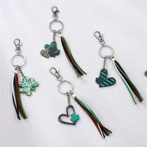 St. Patrick's Day clover heart leather tassel keychain stylish bag charm accessory.