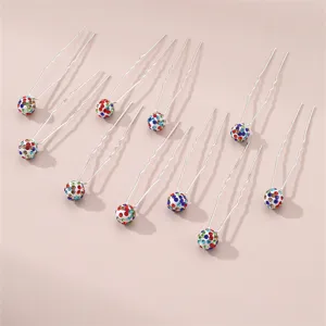 Detail view of cute colorful rhinestone spherical U-shaped hairpins for women elegant styling.