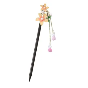 Traditional Chinese style hairpin with enamel floral design and elegant hanging tassels.