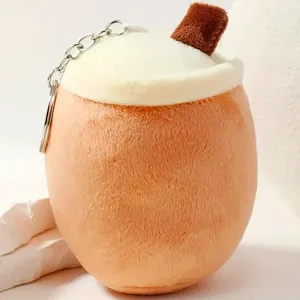 Plush bubble tea cup keychain pendant detail view, soft stuffed toy bag charm accessory.