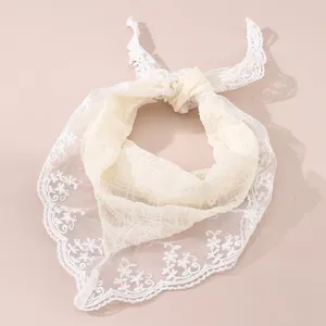 White floral lace headscarf, sweet triangle hair band, delicate mesh fabric detail.