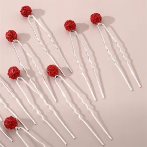 Red rhinestone ball U-shaped hair clip, cute shiny bun pin for women styling detail shot.