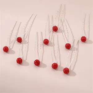 Red rhinestone spherical U-shaped hair pins for women, sweet hair styling and bun accessories.