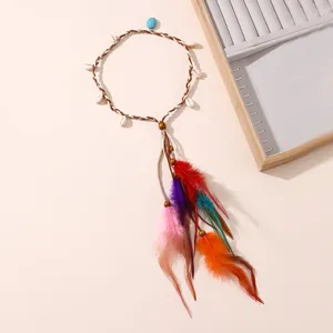 Bandeau bohème en plumes avec coquillages et perles accessoire de cheveux ethnique.