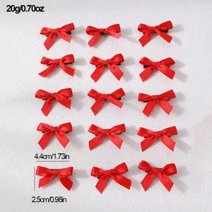 Detail view of red ribbon hair bows, featuring 15 pieces in a set for sweet styles.
