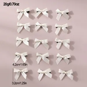 Detail view of mini satin ribbon hair bows, minimalist sweet style, set of 15 pieces.