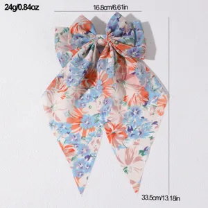 French floral fabric hair bow detail, sweet spring long ribbon spring clip accessory.