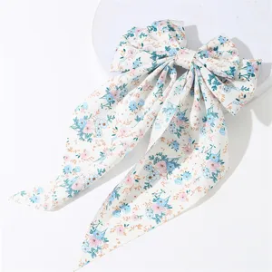 Floral bow hair clip with long tails, sweet style fabric hairpin for women and girls daily wear.