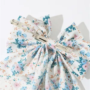 French sweet floral fabric bow spring hair clip for women elegant hair accessories detail view