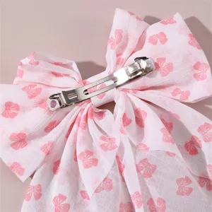 French style pink bow hair clip detail view, sweet fabric spring hairpin for women and girls.