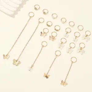 Gold hair rings set with butterfly charms, pearl and bow pendants for DIY dreadlocks braid styling.