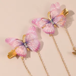 Detailed view of pink mesh butterfly hair clips with gold chains, retro hair accessories for women.