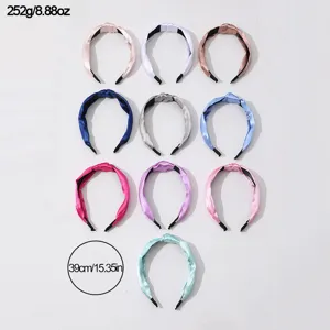 Set of 10 solid color satin knotted headbands for women, elegant hair accessories fashion.