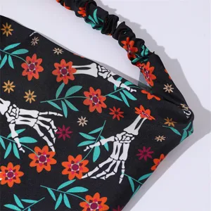 Halloween skeleton hand floral print fabric headband elastic hair accessory detail shot