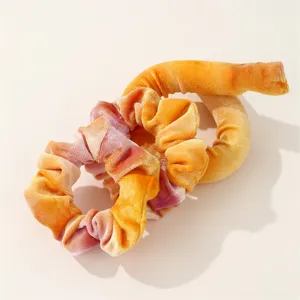 Tie-dye velvet heatless curling rod detail shot, soft fabric, easy hair styling tool.