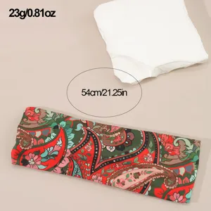 Detailed shot of the vintage paisley print fabric headband, showing the ethnic totem design clearly.