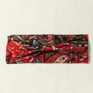 Retro bohemian printed fabric headband detail, stylish ethnic knotted hair accessory for women.