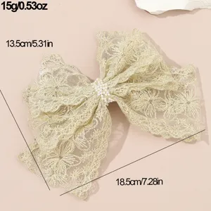 Lace hair bow clip with pearl center, elegant hair accessory, lightweight and stylish.