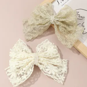 Elegant lace bow hair clip set with pearl center, sweet spring clip for women and girls daily wear.