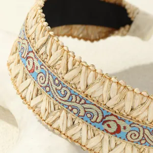 Boho straw headband detail, ethnic embroidered wide hair hoop, stylish pastoral hair accessory.
