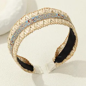 Boho straw headband featuring blue embroidered ribbon, wide braid design for women's daily wear.