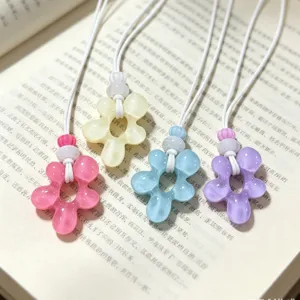 Collier ras du cou fleur en résine colorée, bijoux tressés style doux pour femmes.