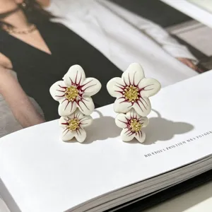 Magnifiques boucles d'oreilles doubles fleurs avec design unique, bijoux élégants pour femmes.