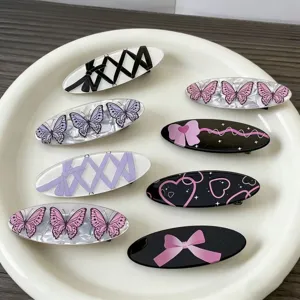 Bonito juego de pinzas para el pelo ovaladas con lazos, mariposas y corazones para diario.