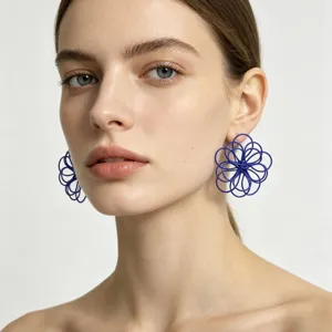 Stunning blue hollow-woven flower earrings, elegant handmade petal design for vacation wear.