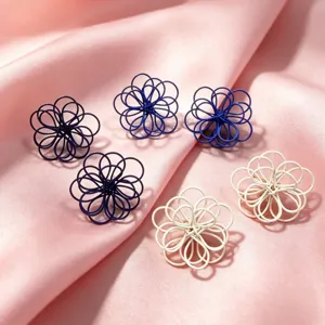 Chic blue and white wire-woven flower stud earrings, elegant handmade floral design for daily wear.