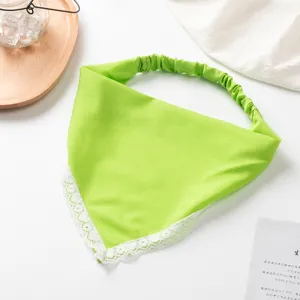 Green triangle hair scarf with white lace trim and elastic band, stylish women hair accessory detail.