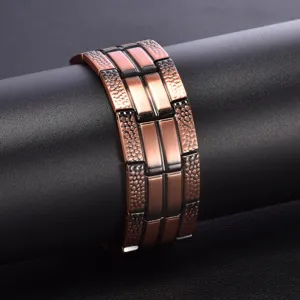 Pure copper magnetic health bracelet with unique cracked design and secure strap buckle closure.