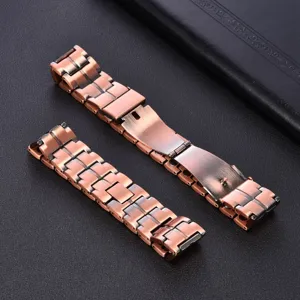 Close-up detail of copper magnetic therapy bracelet strap links, showing texture and design.