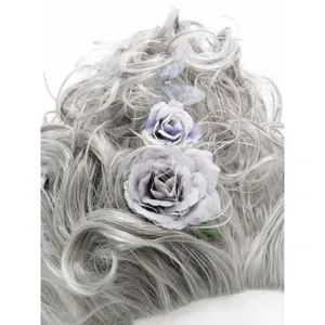 Close-up detail of grey curly wig with purple roses and butterfly hair accessory for baroque.