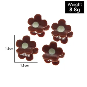 Mini brown floral hair claw detail shot, compact size 1.9cm, lightweight design for styling.