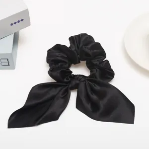 Black satin hair scrunchie with long ribbon bow, elegant ponytail holder hair accessories.