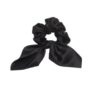 Black satin hair scrunchie with long ribbon bow, elegant solid color hair accessory for women.