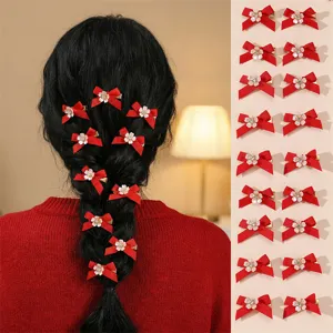 Red bow duckbill hair clip set for women, featuring cute floral rhinestones and ribbons.