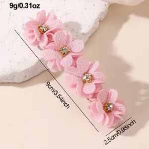 Pince à cheveux fleur rose avec strass étincelants accessoire pour les femmes.