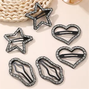 Rhinestone star hair clips detail shot, sparkling crystal hair accessories for women.