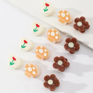 Cute mini hair claw clips with tulips, mushrooms and flowers for daily hair styling.